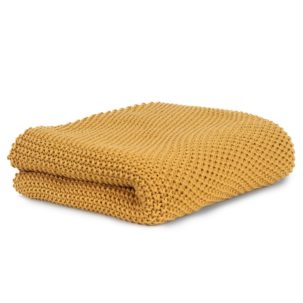 Manta de tricot mostaza