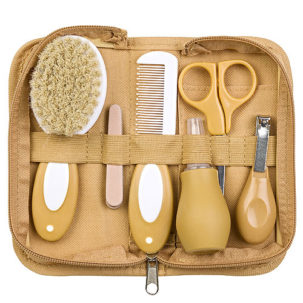 Estuche 7 piezas de aseo para bebé mostaza